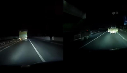 暗夜超车大车远光灯突然一闪