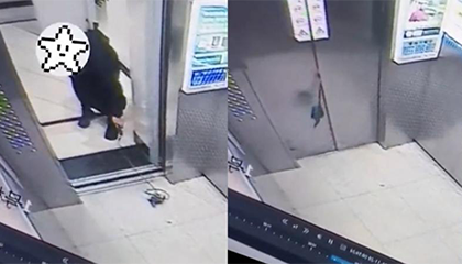 女子故意在电梯门间放绳子